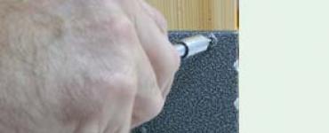 Selecting and installing a rim lock on a wooden door